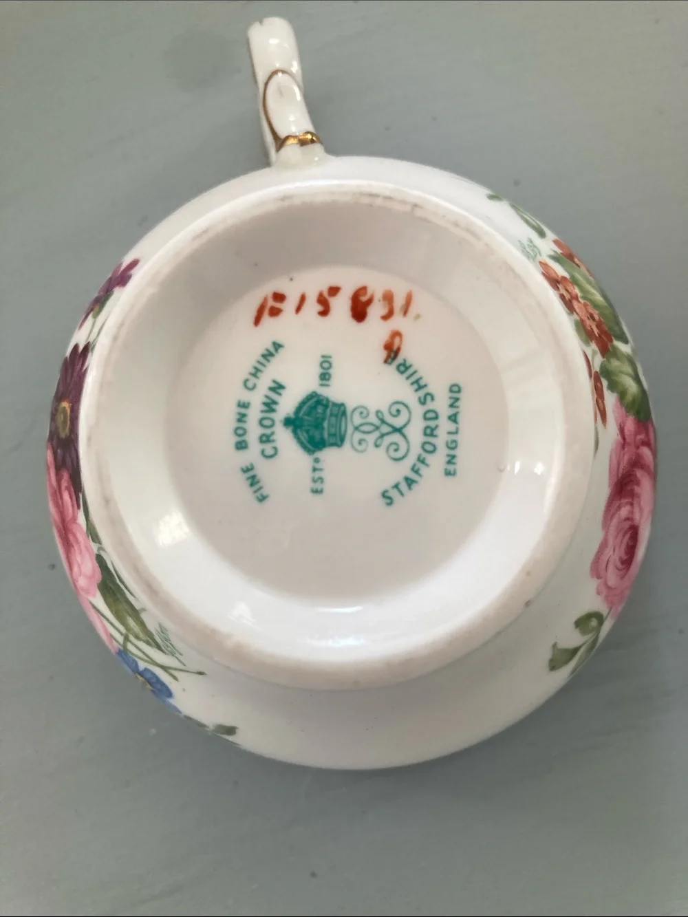 Floral Porcelain Teacup and Saucer with Pink Rose Motif